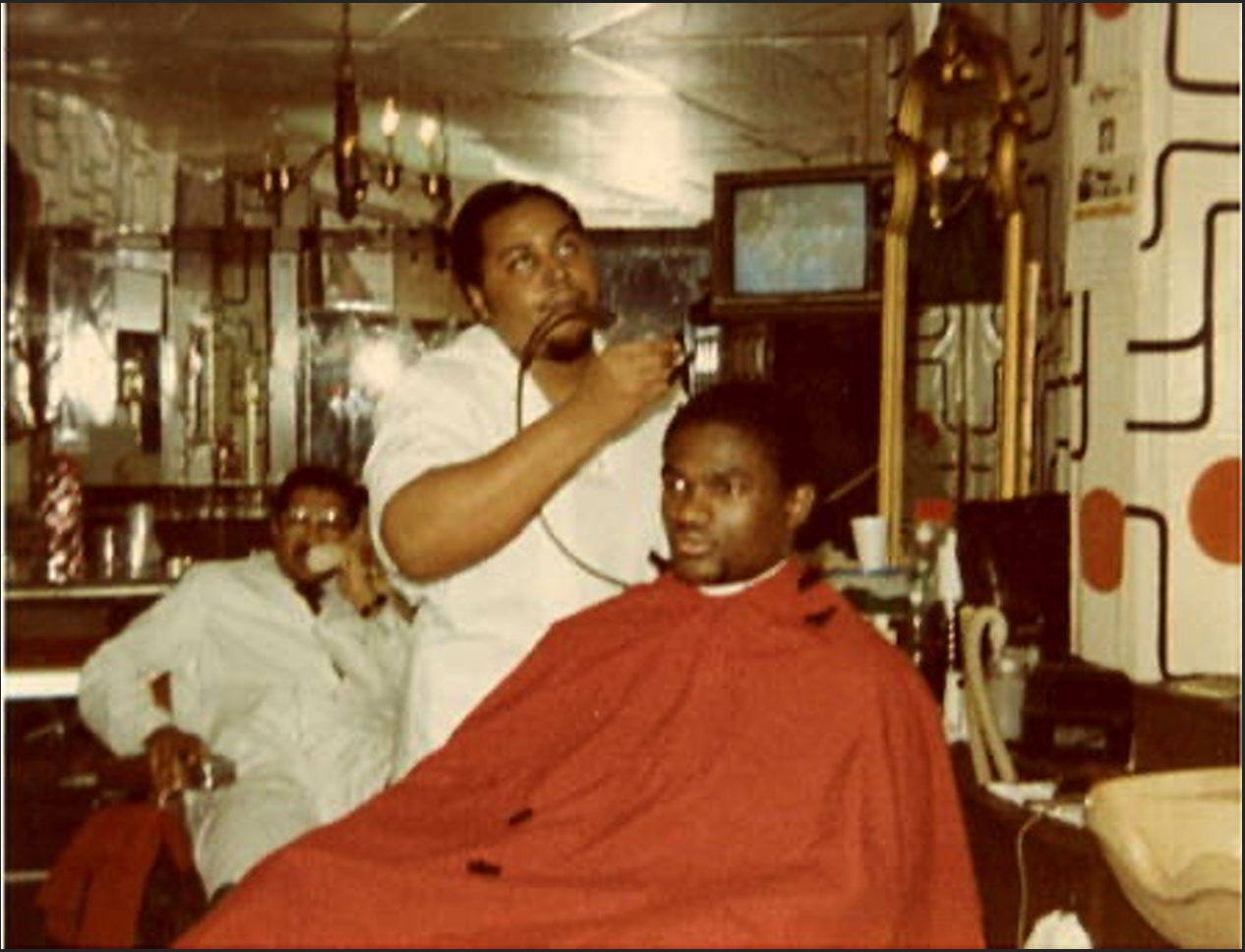 Leroy Cain cutting hair